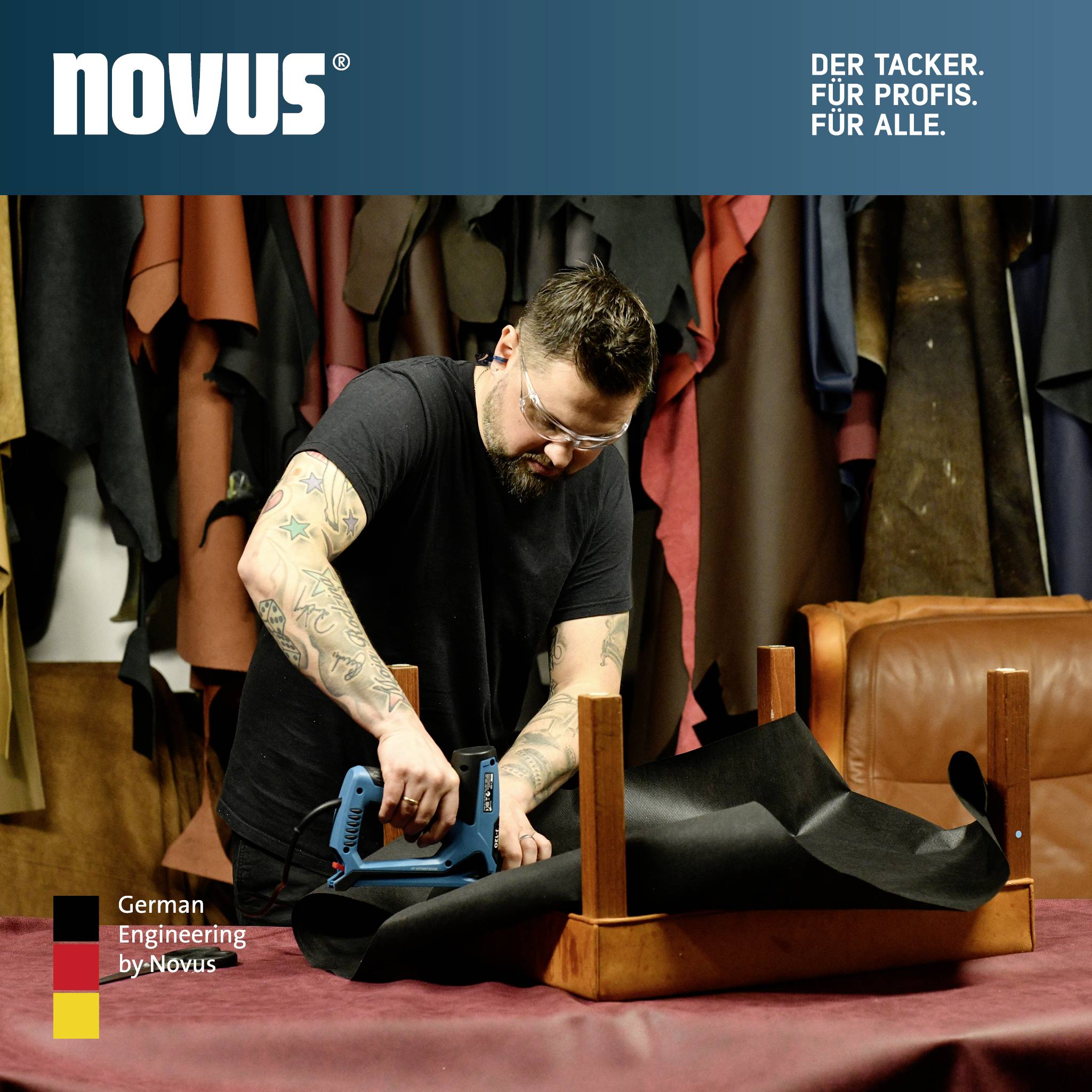 A man is securing a piece of leather to a table using an electric staple gun. Above, the Novus logo and the text 'The Stapler. For Professionals. For Everyone.' are visible.