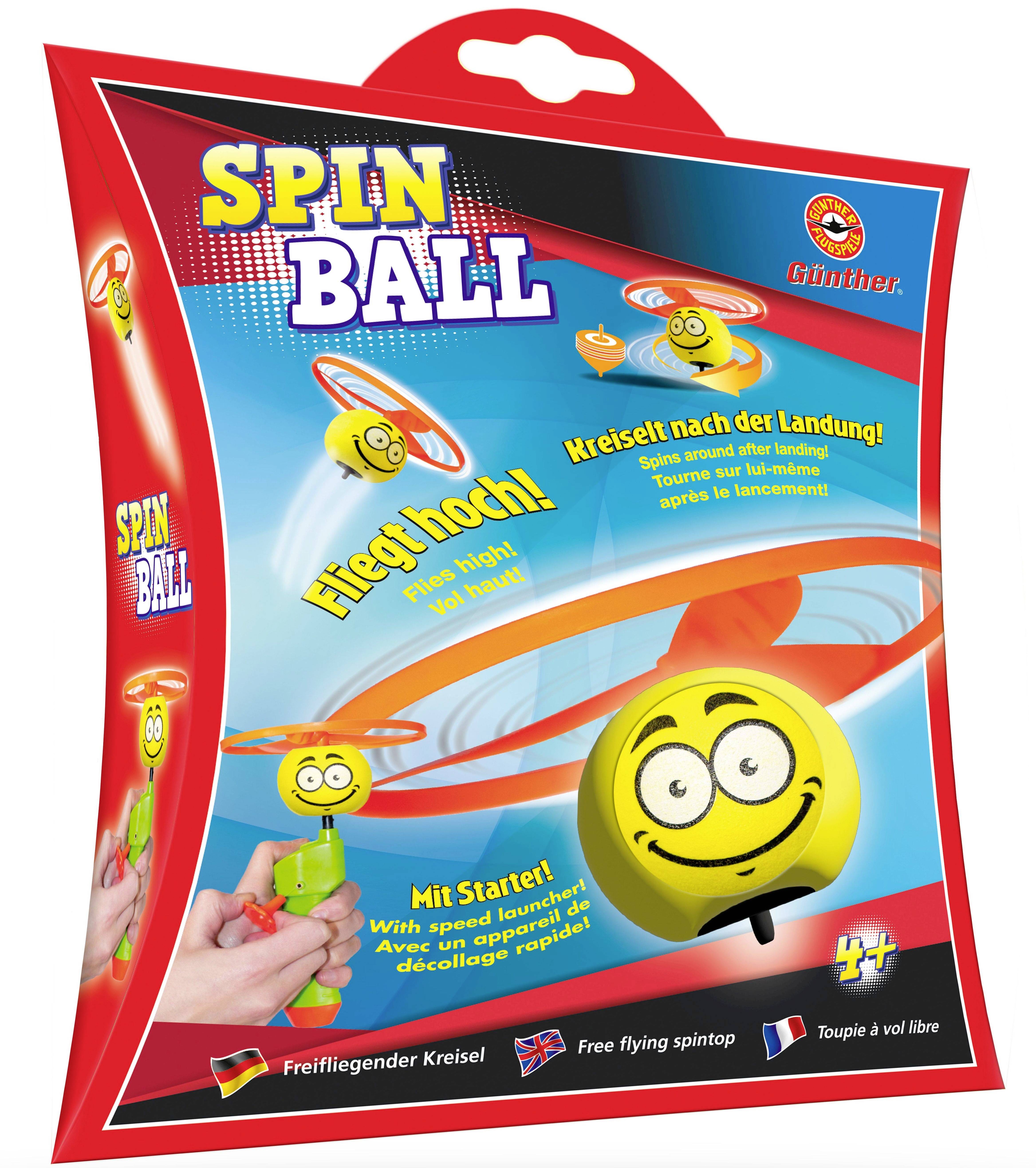 Toy packaging for 'Spin Ball' with flying spinning top, suitable for ages 4 and up, shows cartoon spinning top and starter in action.