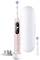 Electric toothbrush with white travel case, pink handle and interchangeable brush head.