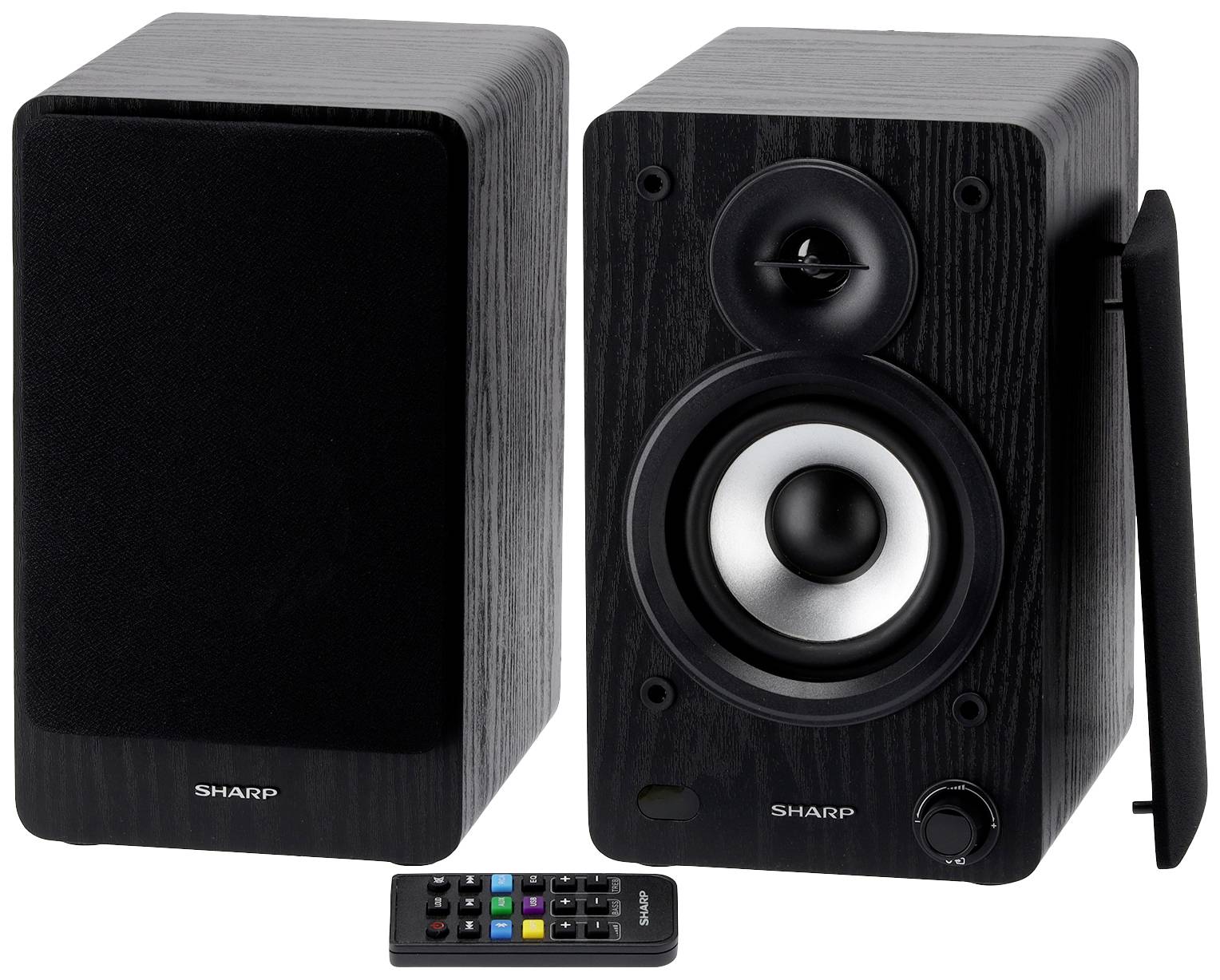 Two black speakers, one active with controls and a tweeter, one passive, with a remote control in front.