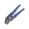 Crimping pliers with blue handles for stripping and crimping cables, used in electrical repairs.