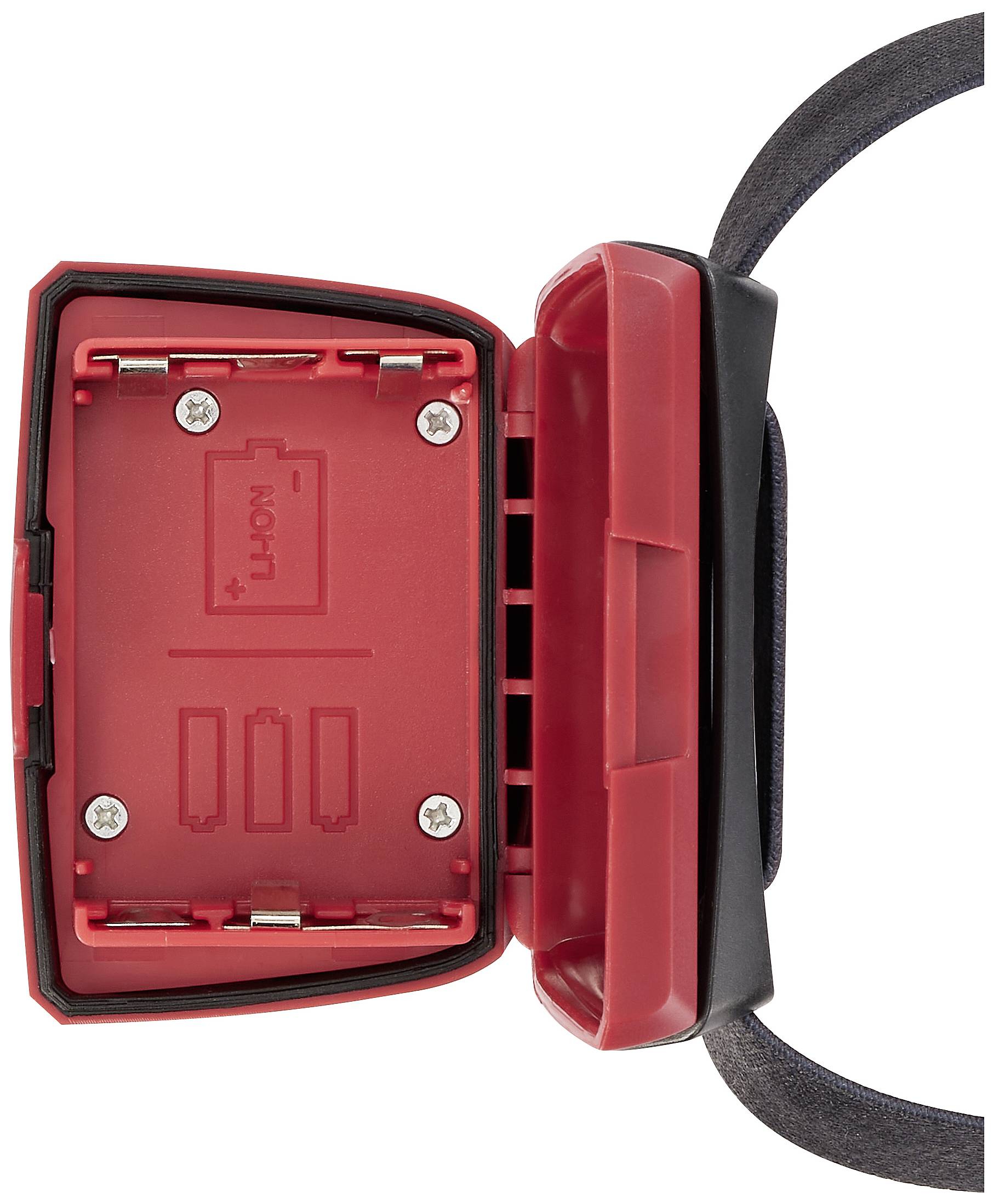 Open battery compartment of a head torch, showing the empty compartment with symbols indicating battery orientation.