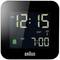 Digital square clock with a black frame displays 12:15. Alarm set for 7:00 am.