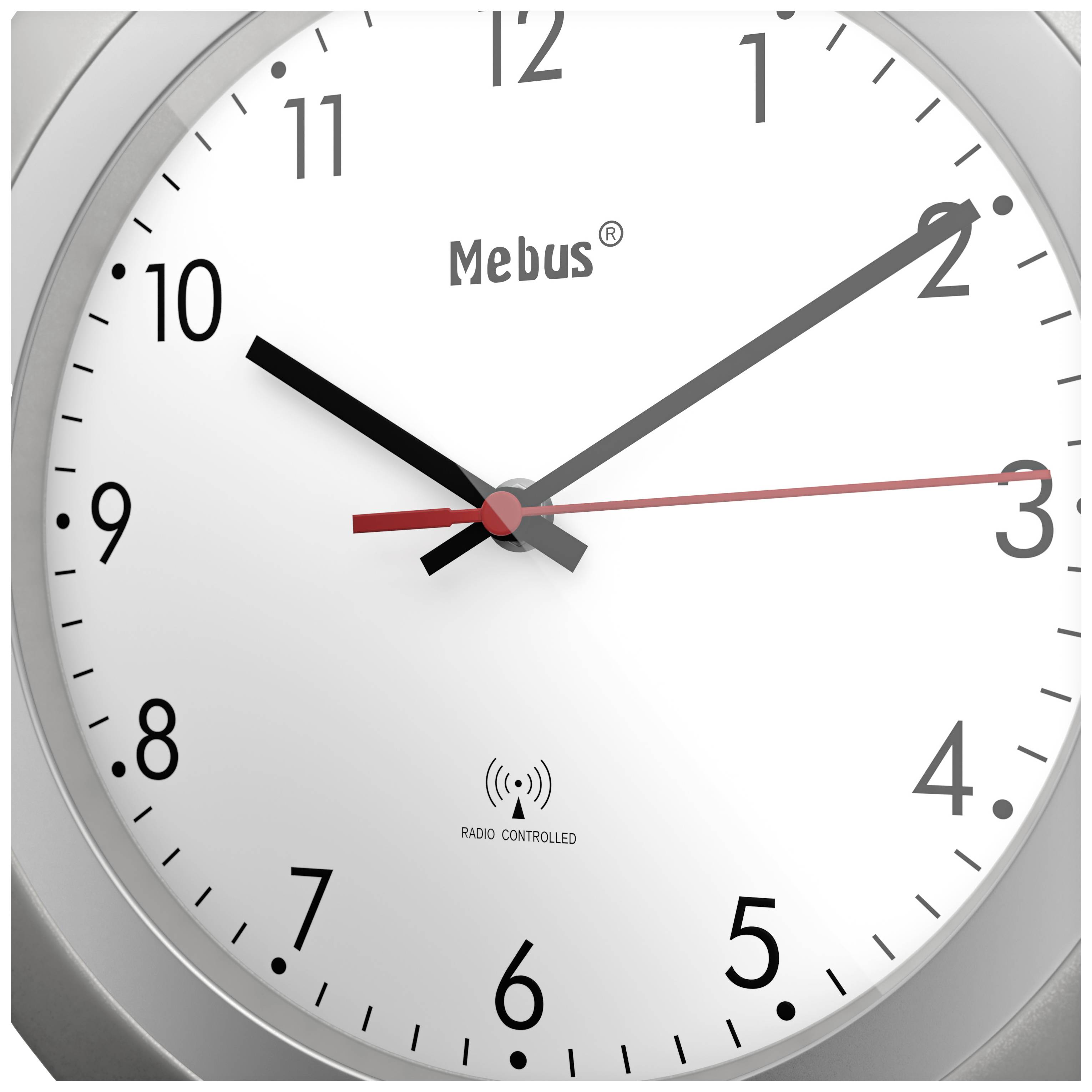 An analogue 'Mebus' wall clock shows 10:08.