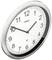 An analogue wall clock shows 10:09. The dial is white with black numbers and two hands.