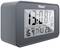 A grey digital alarm clock displays the time as 13:08, the date as 16 July, and a temperature of 23.6°C.