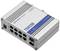 A grey-blue network switch 'TSW200' from Teltonika Networks with multiple Ethernet ports and a robust, metallic enclosure.