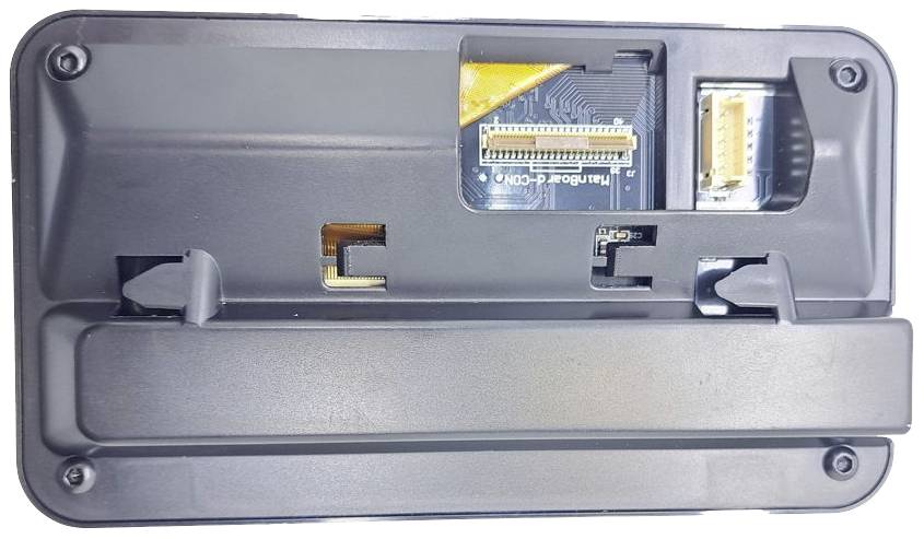 A black plastic enclosure with electronic connections and circuit board cutouts on the back, likely a device component.