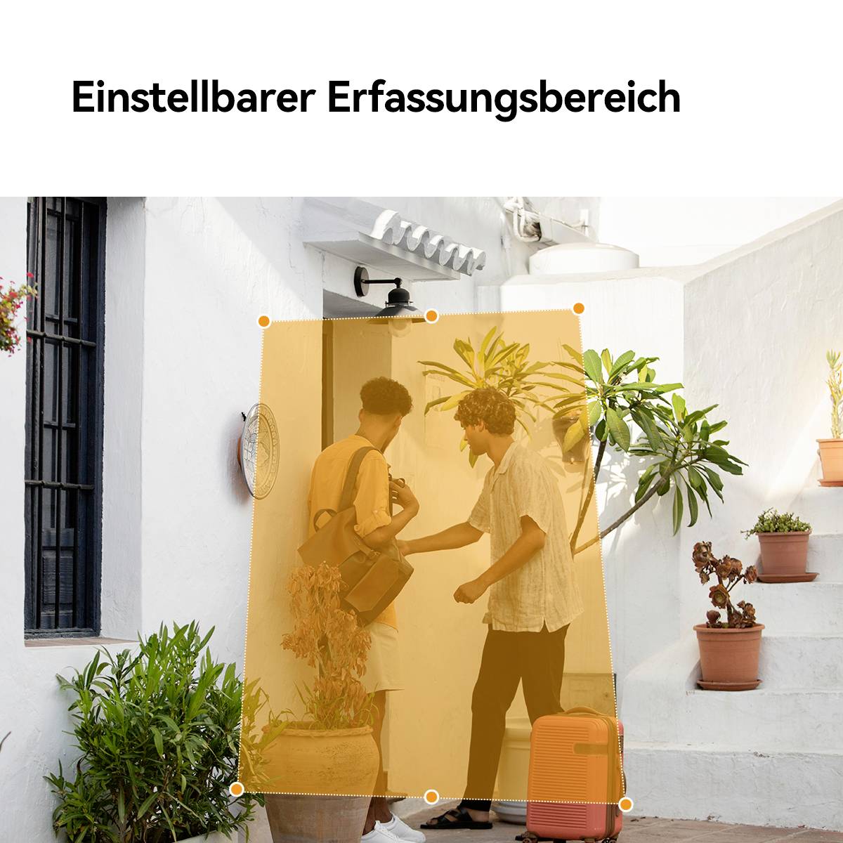 A group of young adults is standing outside a white building. One person is pointing at something while the others listen.