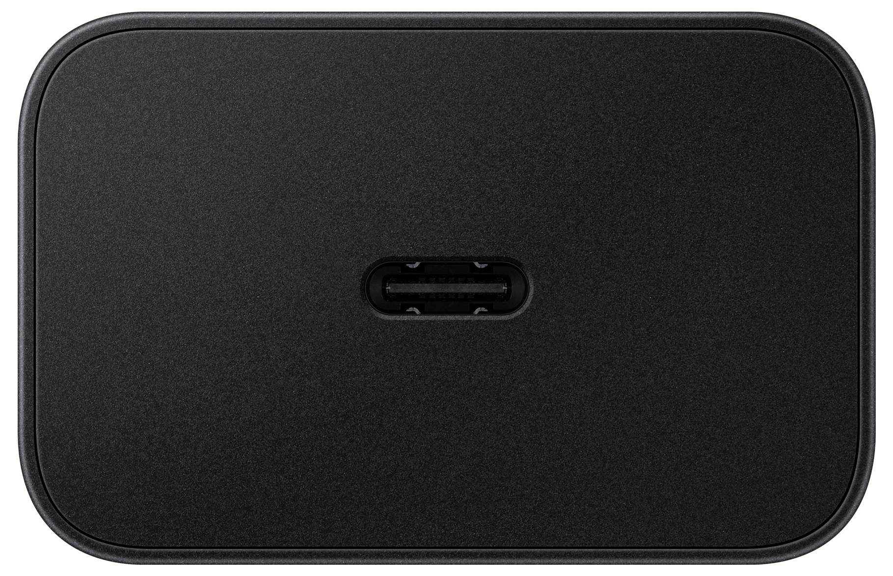 Black wireless charger with an oval shape and a central slot for charging devices.