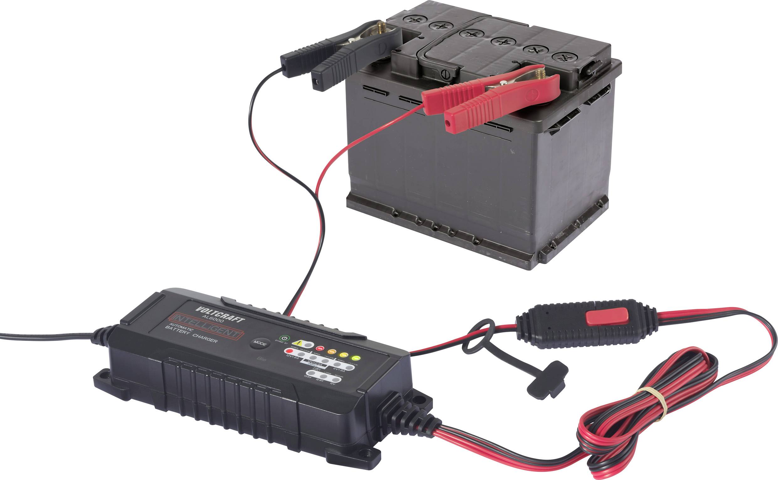 A battery charger is connected to a car battery. The terminals are securely fastened. The charger is displaying the charging status.