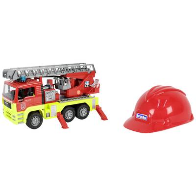 Toy fire engine with ladder next to a red safety helmet; both items designed for children's play.