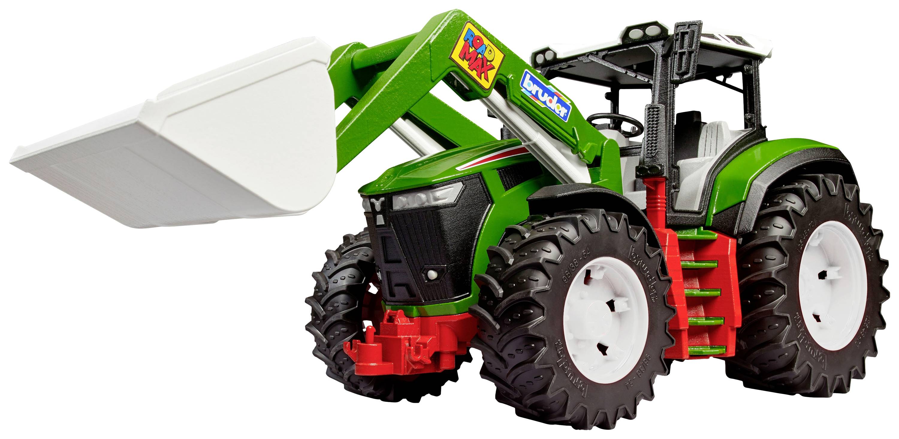 A green toy tractor with a white front loader is visible. The tractor has large black tyres and colourful stickers.
