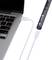 A laptop with a USB port, connected by a USB cable to a thin, elongated electronic device.