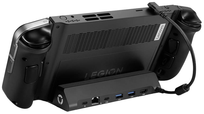 A portable gaming device viewed from behind, connected to a docking station. It shows connections for HDMI, USB, and network.