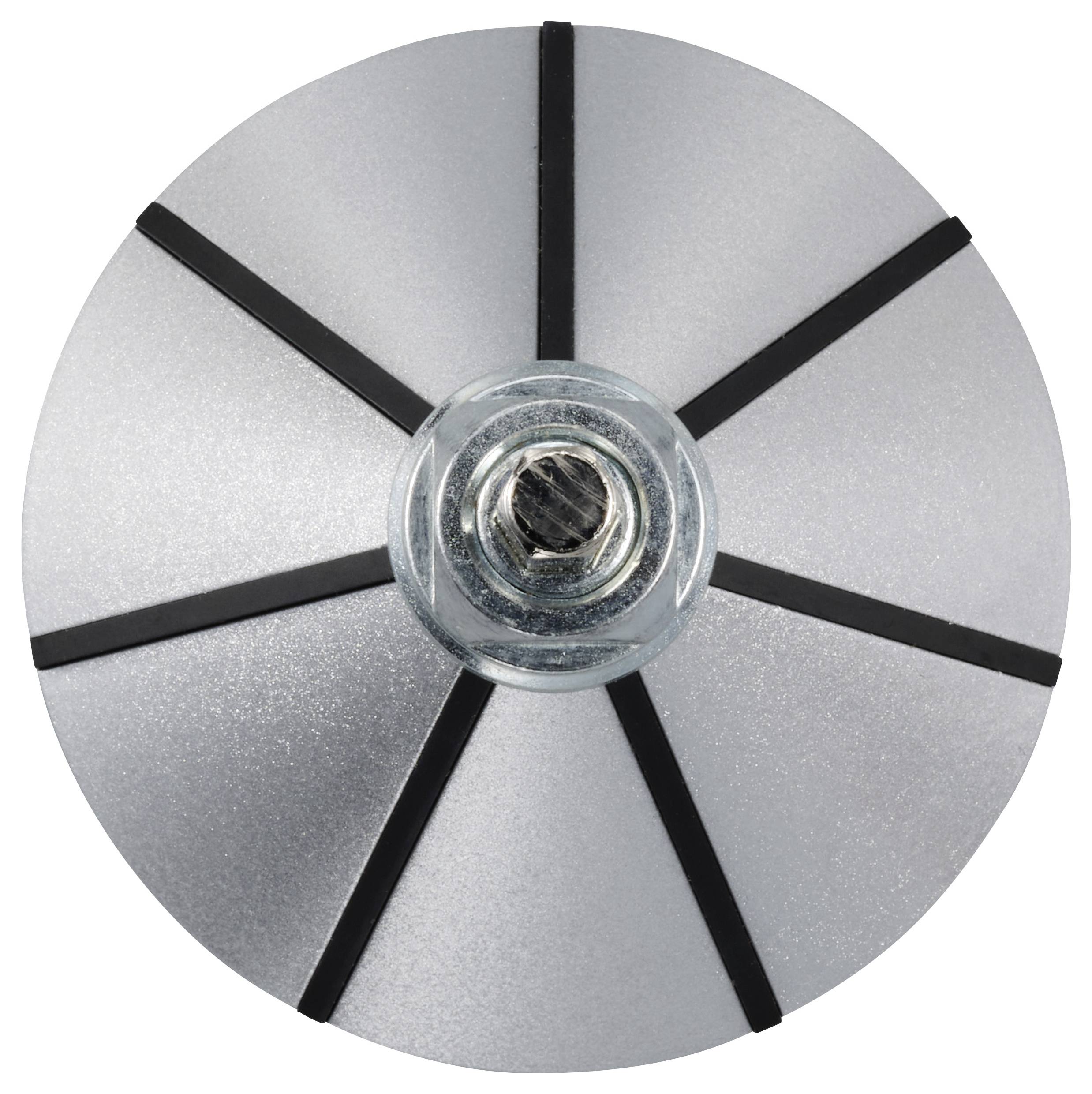 Close-up of a silver, circular structure with eight black spokes and a metallic centre.