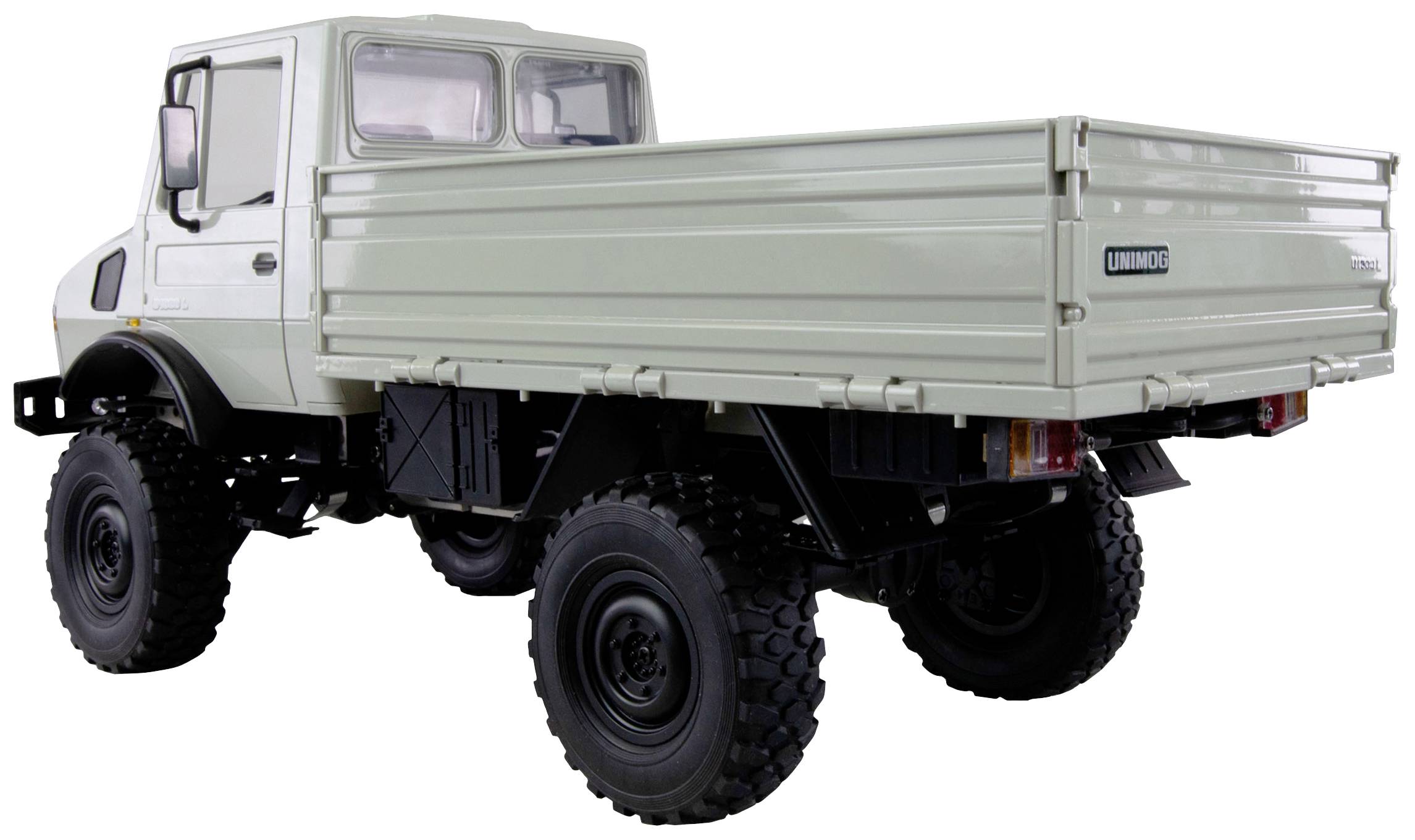 A light high-ground clearance lorry, renowned for its off-road capabilities. Rear view shows cargo bed and robust tyres.