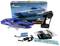 Remote-controlled toy racing boat set with charger, battery and instructions. Packaging shows blue boat on water.