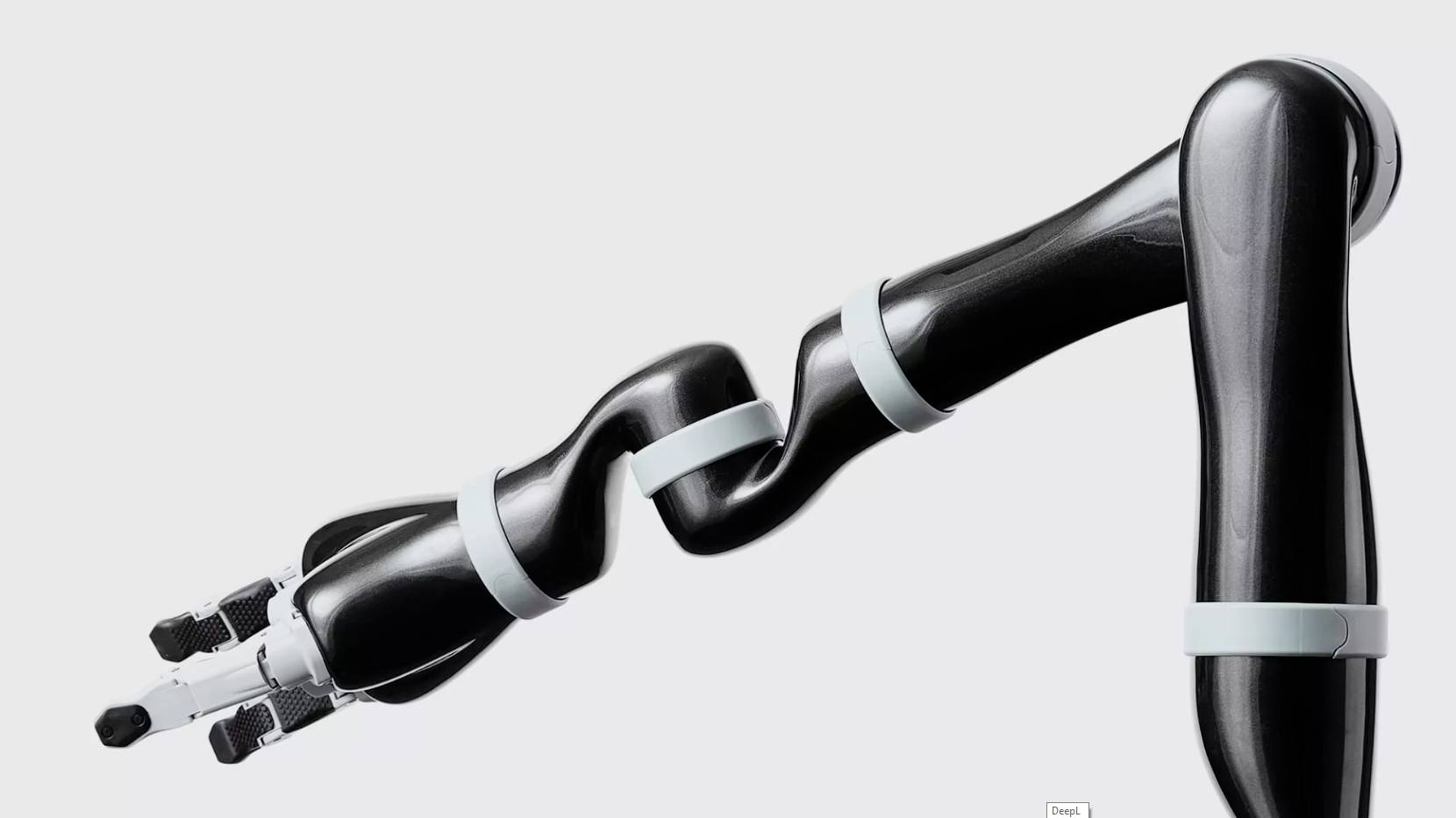 A black robotic arm with multiple joints in an S-shape. It has a gripper at the end, designed for precise movements.