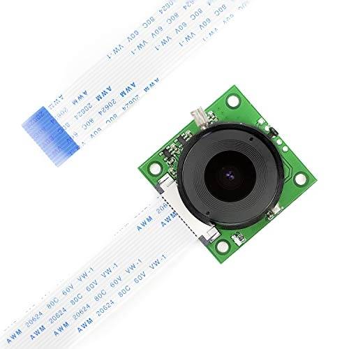 A green printed circuit board with a mounted camera lens connected by a white flat ribbon cable.