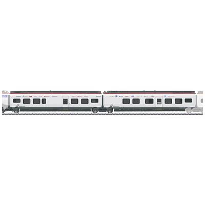 Two modern train carriages on railway tracks. External logos of various rail companies. The train is white with red and blue details.