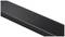 Black soundbar with a central volume control and a few small buttons on top, suitable for home cinema or multimedia setups.