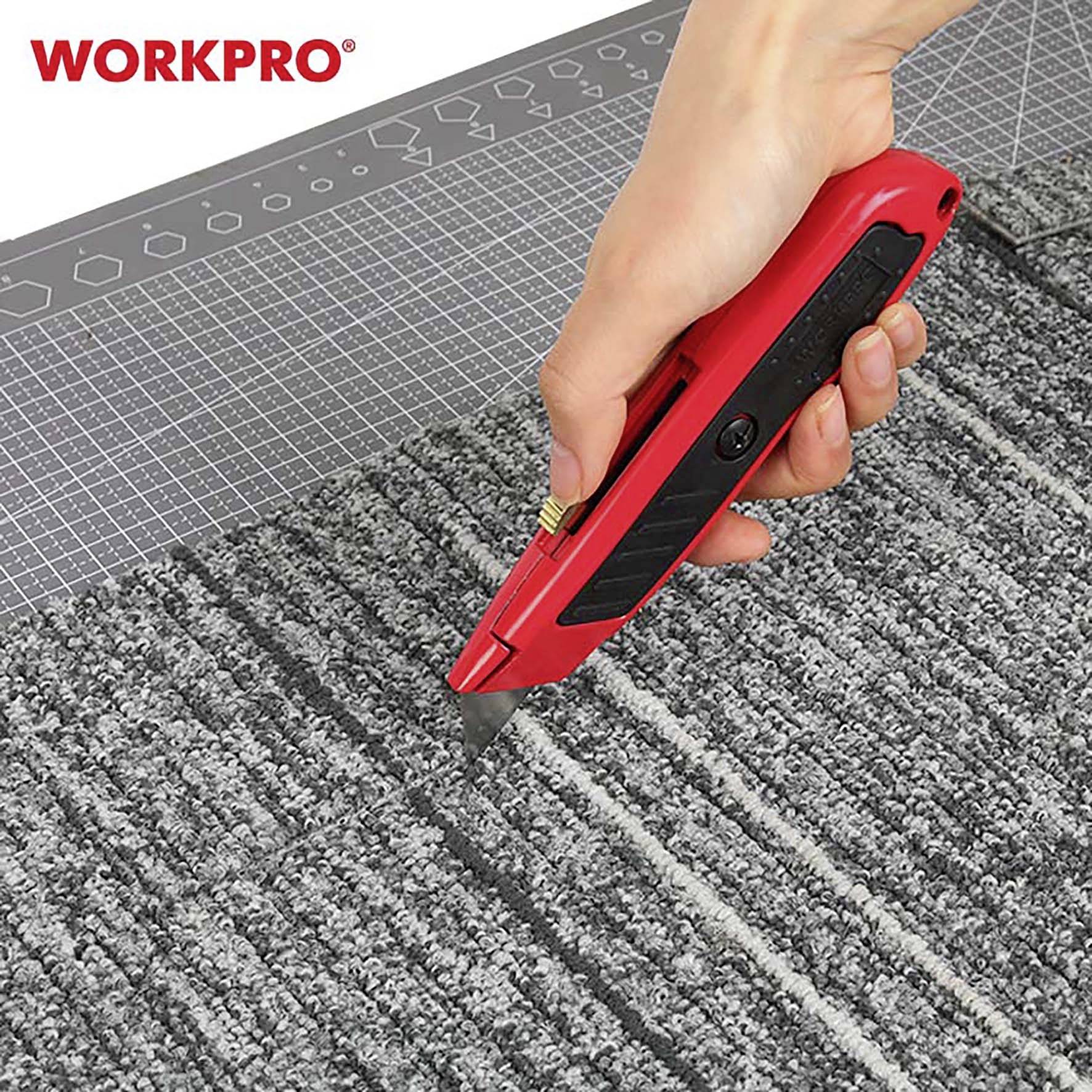 A hand is cutting a grey carpet with a red CUTTEX knife on a grey cutting mat.