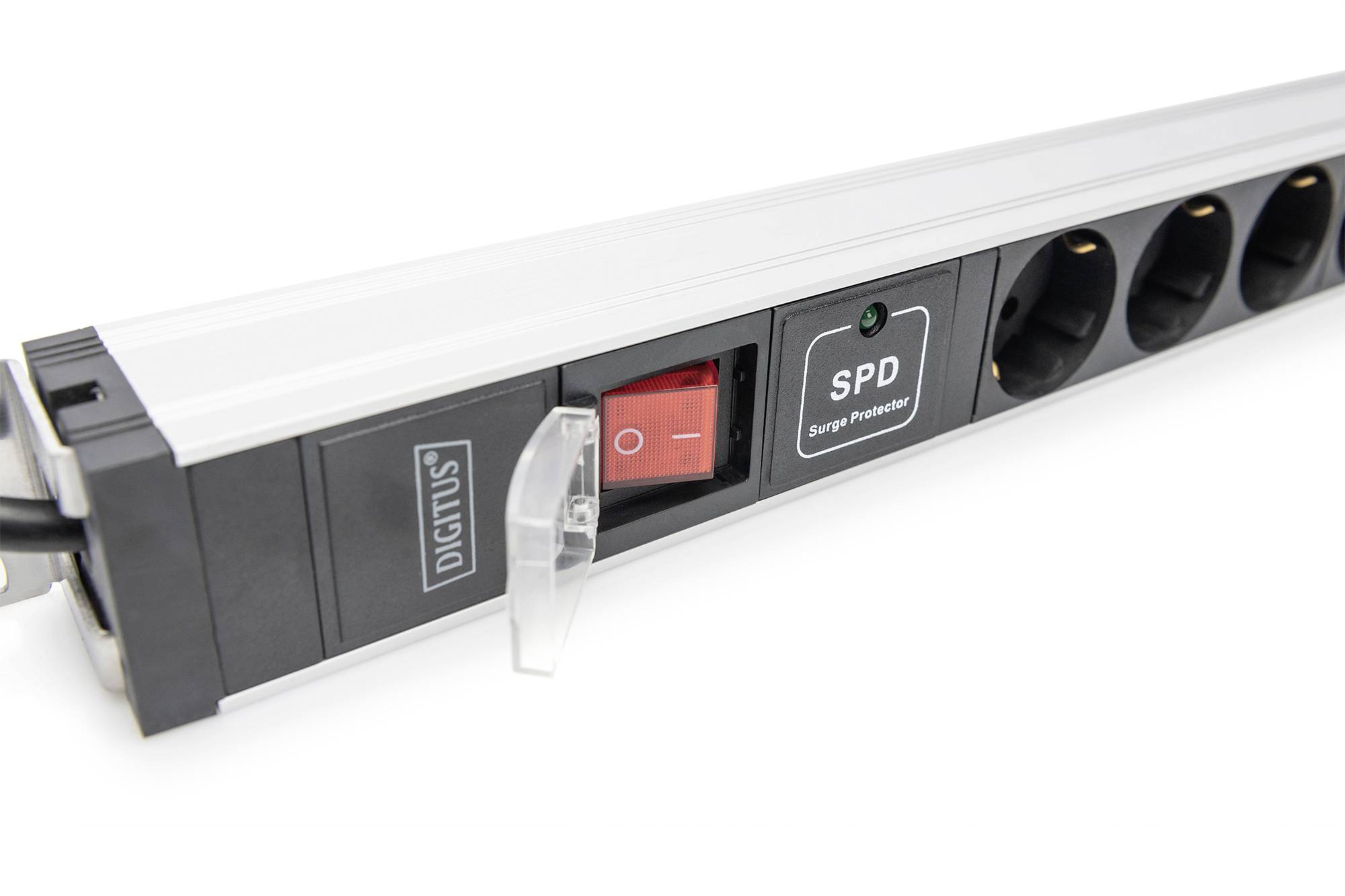 Multi-socket extension with surge protection, red switch, and four plug sockets. Brand name 'Digitus' visible.