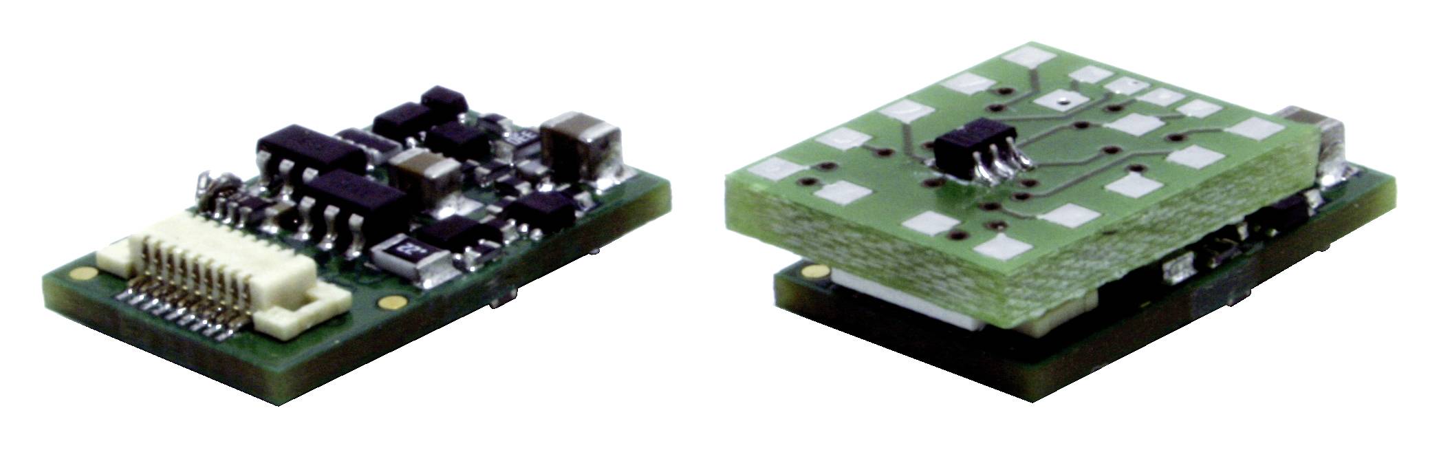 Two green electronic circuit boards with various components, showing a compact arrangement of circuits and connections.