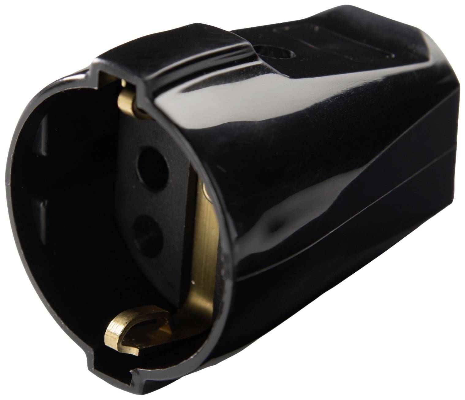 A black electrical adapter with copper connectors. Circular design with interior connection points visible. Purpose: Electrical connection.