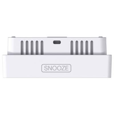 A white electronic device with ventilation slots and the word 'SNOOZE' printed on the front. Purpose of the device unknown.