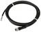 Black electrical cable with a silver plug end and exposed wires on the other side, coiled up.
