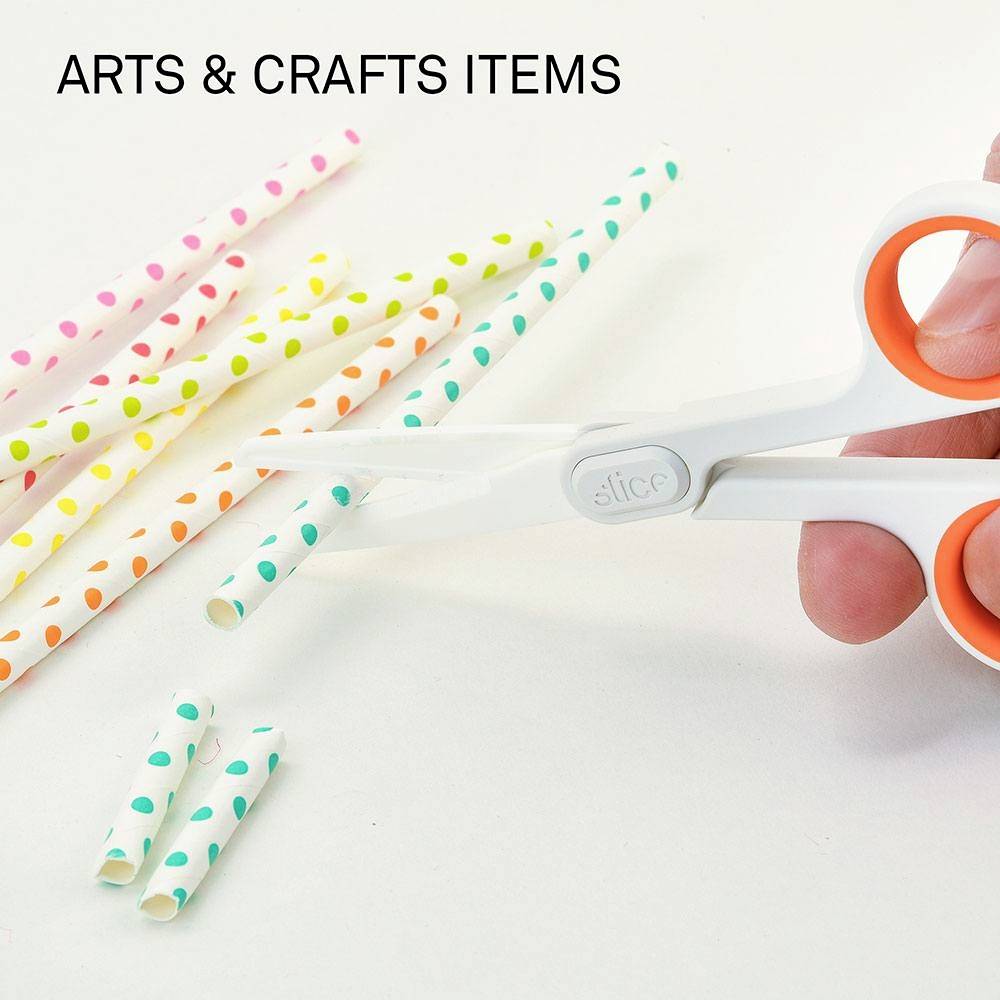 A hand is holding scissors and cutting colourful paper straws. Text at the top: 'ARTS & CRAFTS ITEMS'.