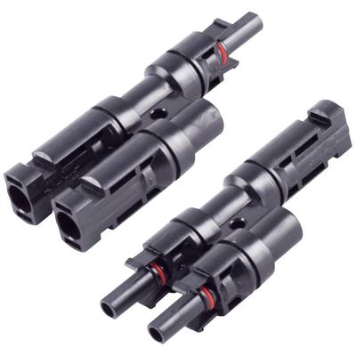 Two black plastic plugs with red sealing rings, lying side by side, without any additional decoration.