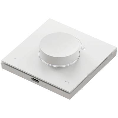 White, square volume control with a large knob on a flat base, USB port on the side edge.