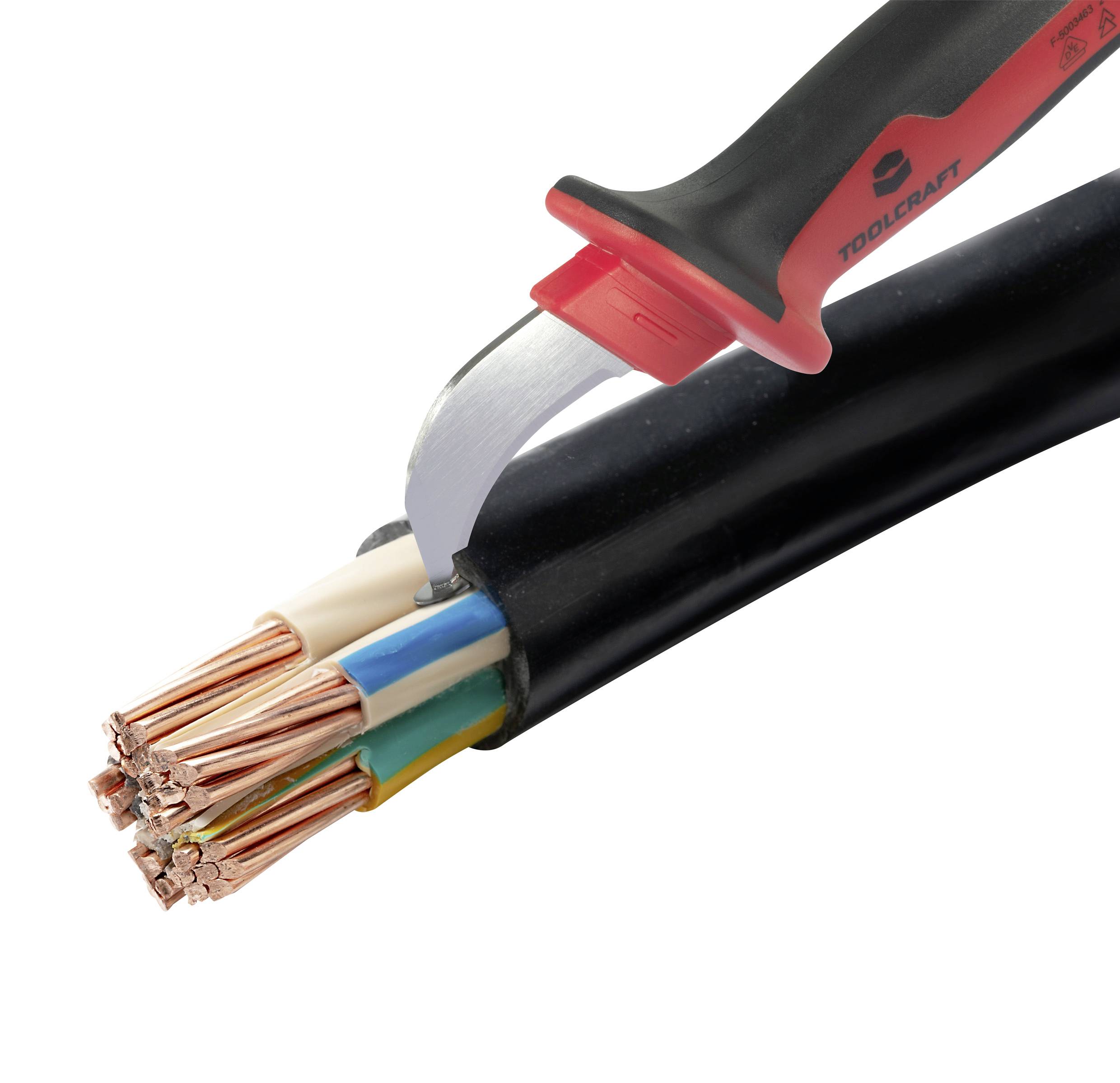 A tool cuts open a cable, revealing the exposed copper wires and the colourful insulation of the inner cable cores.