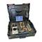 'Opened toolbox with various electrical measuring instruments, including a multimeter, in a moulded insert.'