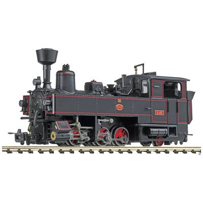 A model of a black steam locomotive with red accents sits on railway tracks. The locomotive displays detailed components and markings.