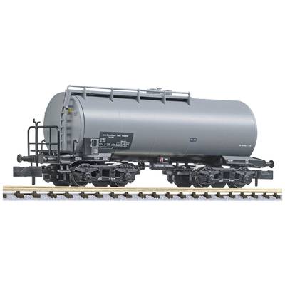 A grey tank wagon is standing on a railway track, intricately detailed for model railway enthusiasts.