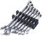 'Set of six silver ratchet ring spanners in various sizes, arranged in a black holder.'