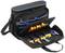 Tool bag with an open compartment showing various isolated screwdrivers, pliers and a tape measure. Side and inner compartments.