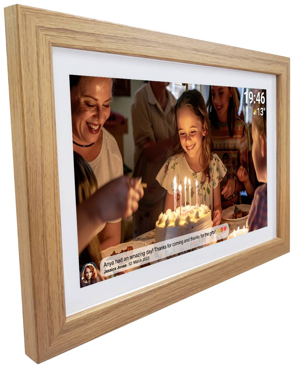 A girl smiles while blowing out birthday candles on a cake, surrounded by smiling people in a cosy room.