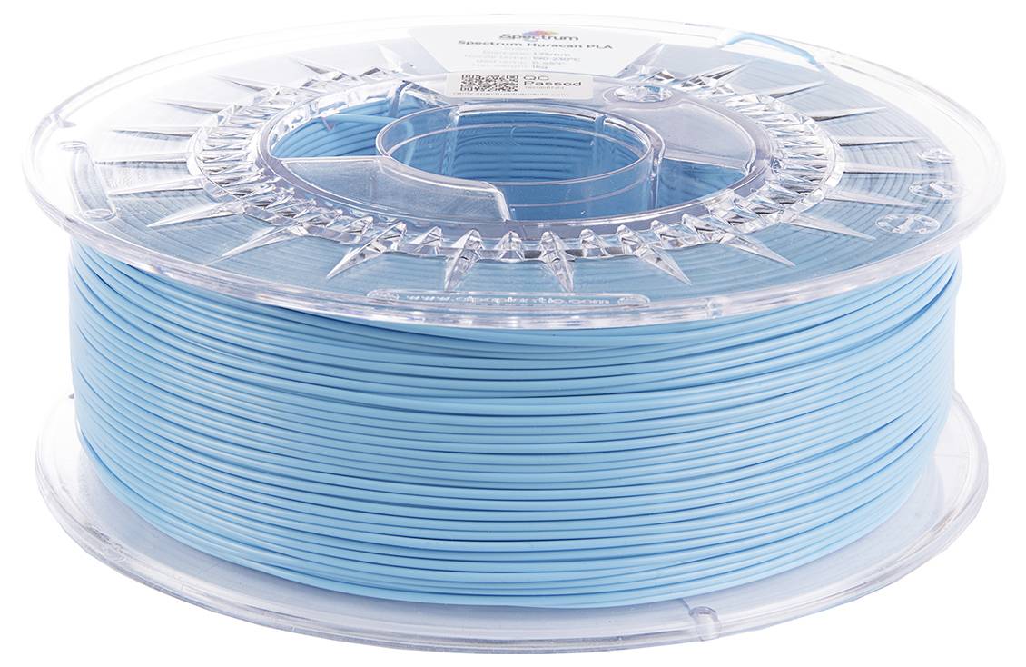 A spool of light blue 3D printing filament. The spool is transparent, revealing the wound filament.
