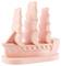 A small, pink 3D-printed model of a sailing ship with multiple sails.