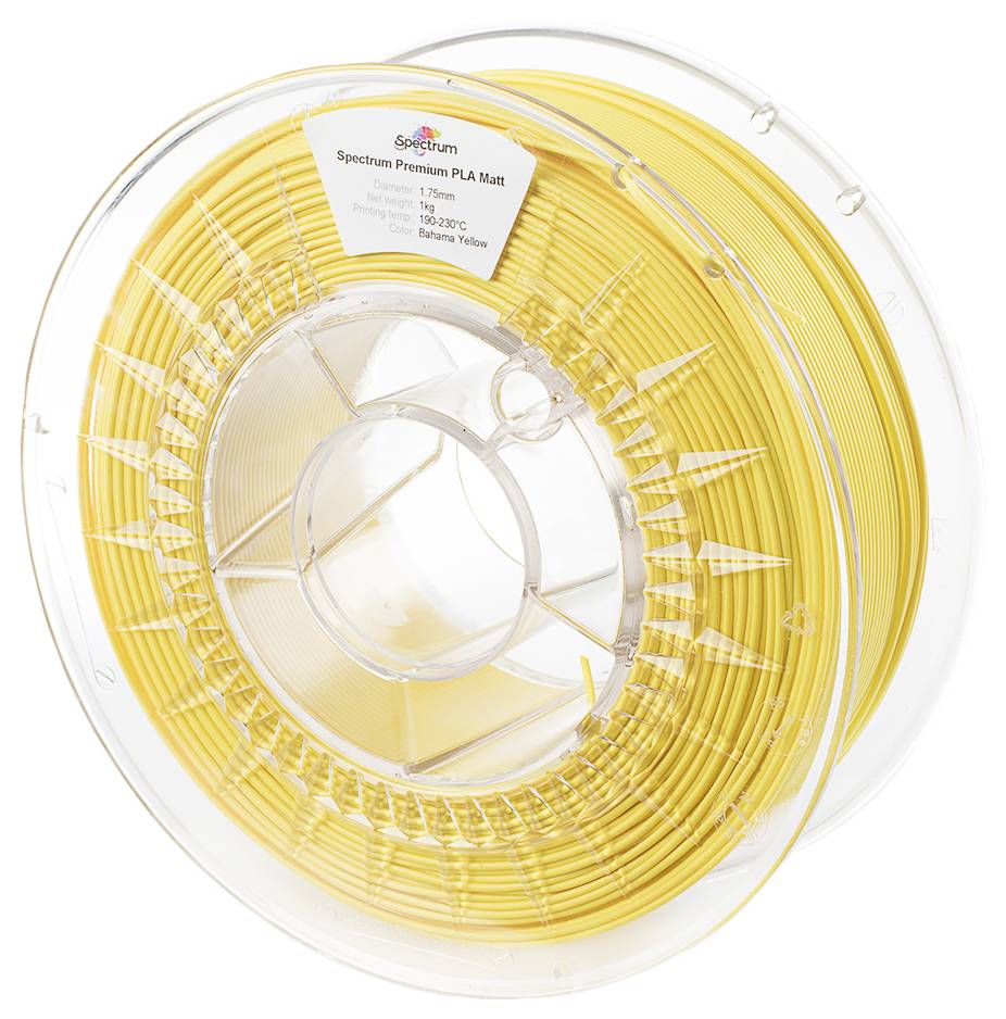 Yellow filament spool labelled 'Spectrum Premium PLA Matt'. Plastic spool with visible wire winding and specification label.