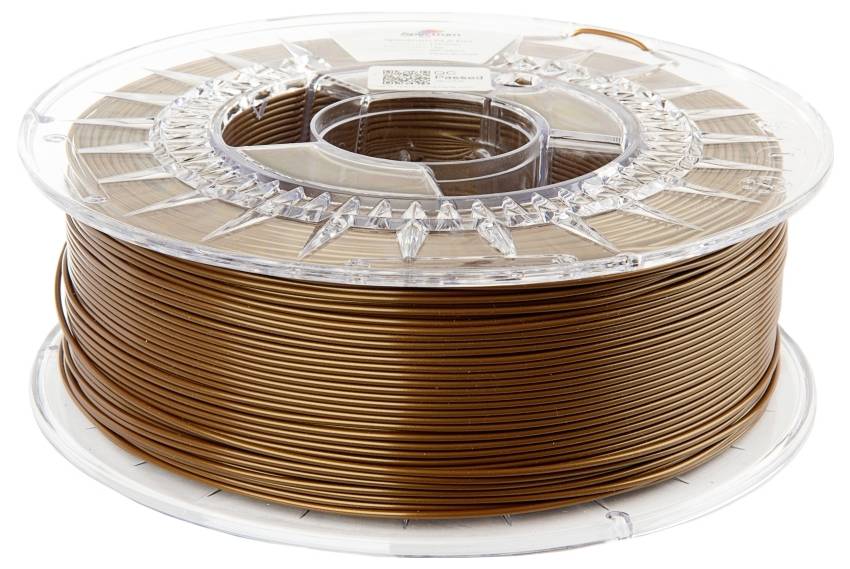 A transparent spool contains brown 3D printing material, also known as filament.