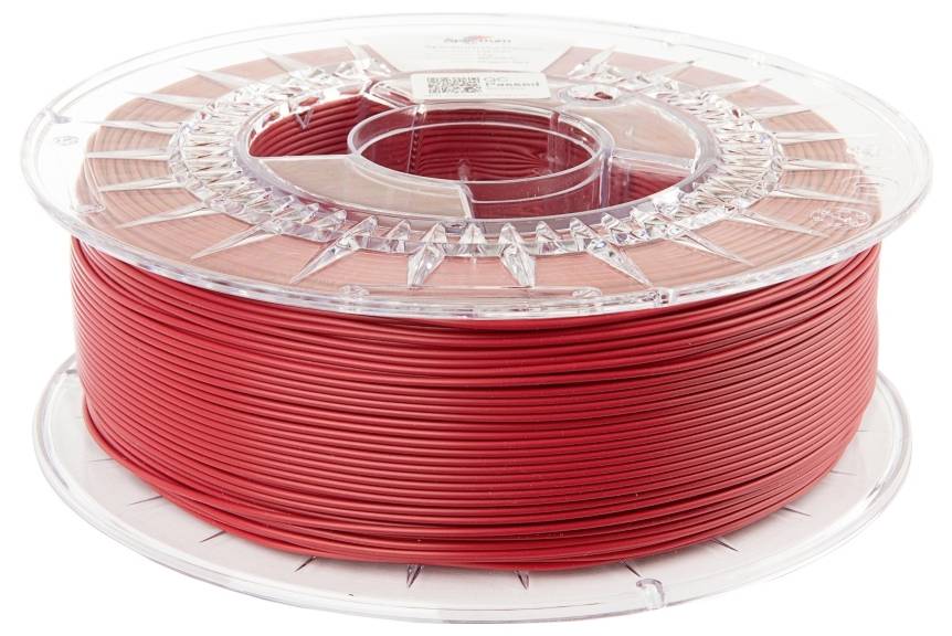 Red filament spool for 3D printer, presented on a transparent plastic carrier from the side.