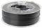 A transparent spool of black 3D printer filament, lying on a clean, white surface.