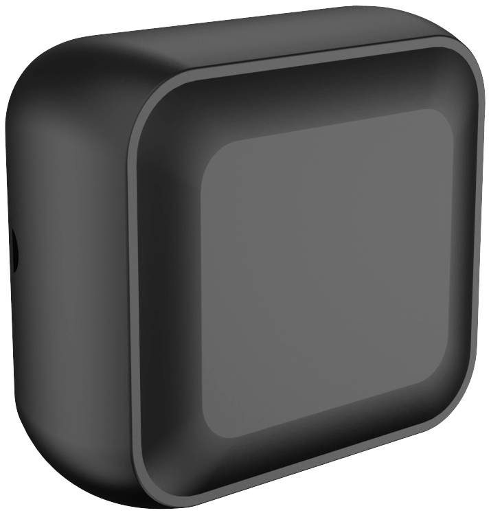 A black, square plastic object with rounded corners. The central area is recessed and smoother than the surrounding surface.