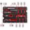 A tool set with screwdrivers, pliers and sockets in a moulded insert. Tools are red and black with brand logo.